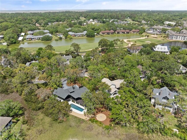 birds eye view of property featuring a water view and a residential view