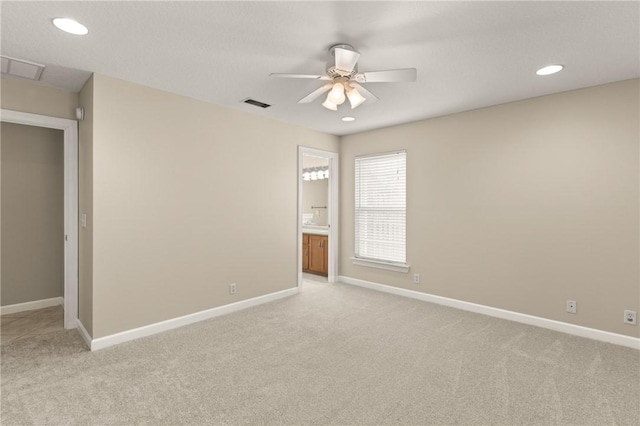 172 Autumns Ridge Ct, Brunswick, GA 31525 - unfurnished bedroom featuring light colored carpet, recessed lighting, ensuite bathroom, and ceiling fan