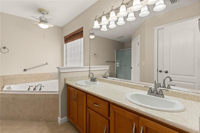 172 Autumns Ridge Ct, Brunswick, GA 31525 - bathroom featuring a garden tub, tile patterned floors, double vanity, ceiling fan, and an enclosed shower