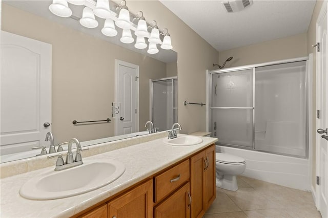 172 Autumns Ridge Ct, Brunswick, GA 31525 - full bath with double vanity, tile patterned flooring, and bath / shower combo with glass door