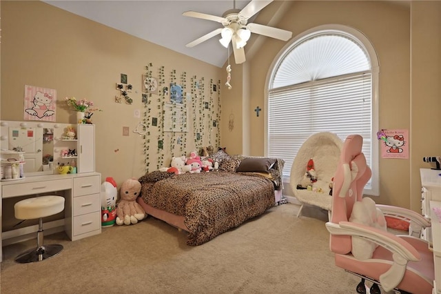 carpeted bedroom featuring a ceiling fan and lofted ceiling