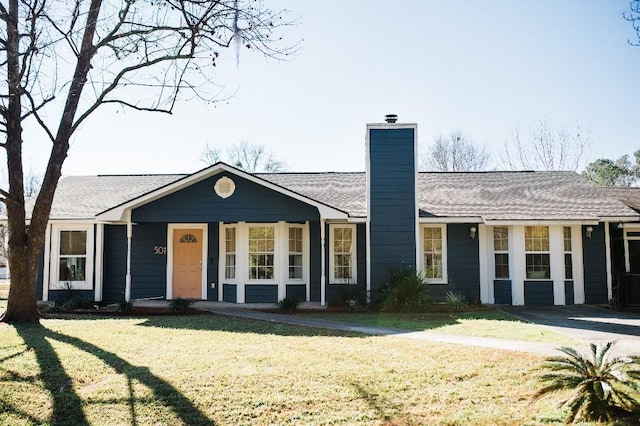 ranch-style house with a front yard