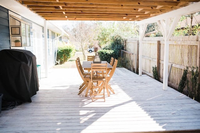 wooden terrace with grilling area