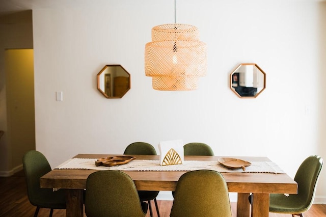 dining room with hardwood / wood-style floors