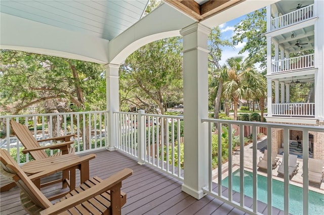 622 Beachview Dr, Saint Simons Island, GA 31522 - wooden terrace featuring an outdoor pool