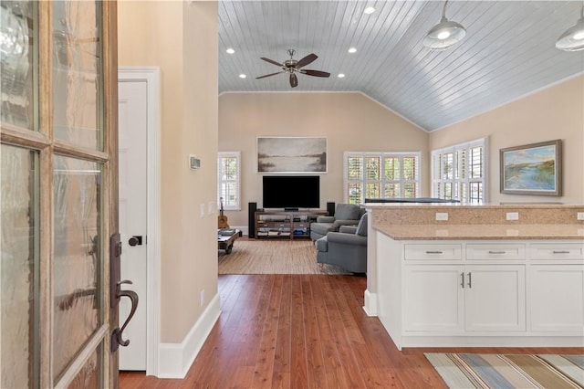 622 Beachview Dr, Saint Simons Island, GA 31522 - kitchen featuring wood ceiling, white cabinets, vaulted ceiling, healthy amount of natural light, and wood-type flooring