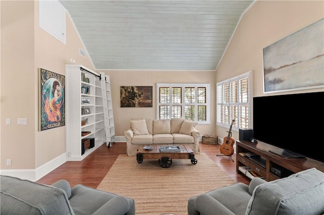 622 Beachview Dr, Saint Simons Island, GA 31522 - living area with wood finished floors, high vaulted ceiling, and wooden ceiling