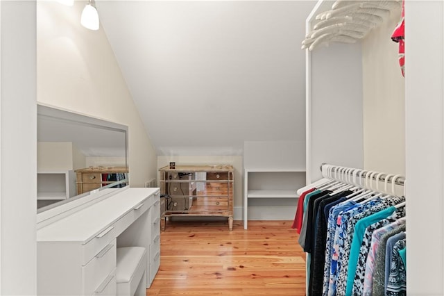 622 Beachview Dr, Saint Simons Island, GA 31522 - spacious closet with light wood-type flooring and lofted ceiling