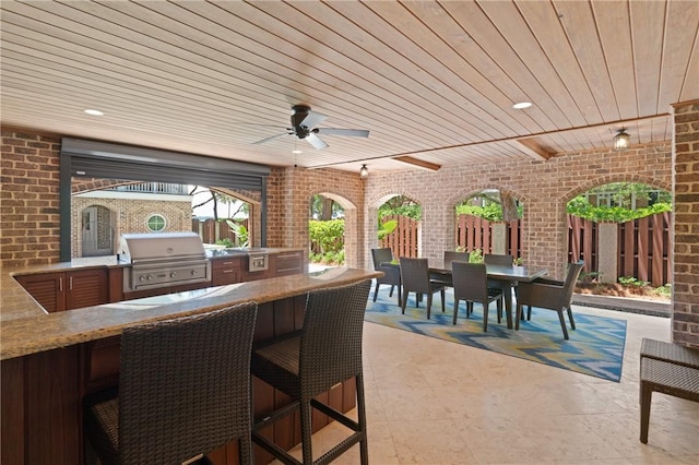 622 Beachview Dr, Saint Simons Island, GA 31522 - view of patio featuring outdoor dining space, area for grilling, and ceiling fan