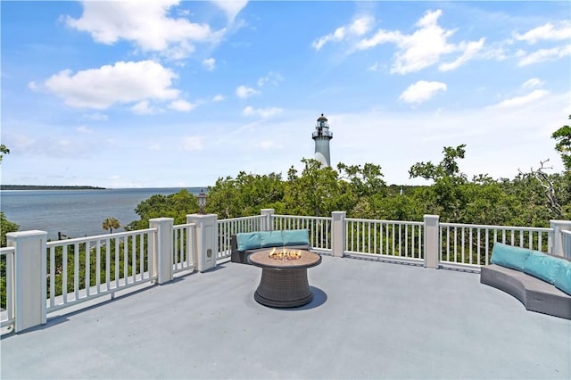 622 Beachview Dr, Saint Simons Island, GA 31522 - view of patio / terrace featuring a fire pit and a water view