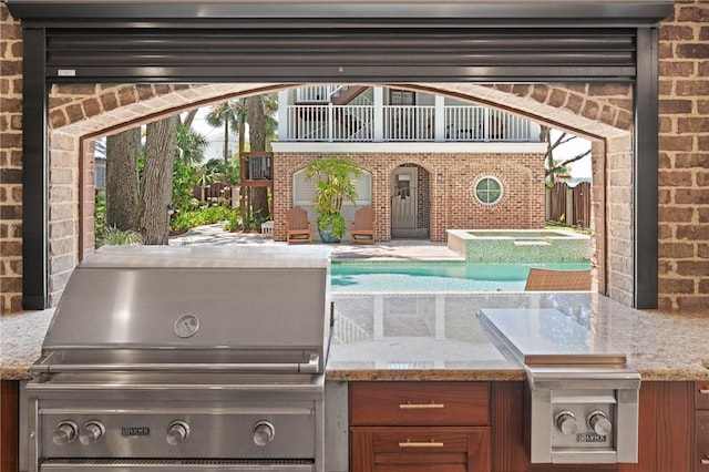 622 Beachview Dr, Saint Simons Island, GA 31522 - patio / terrace featuring an outdoor hot tub, an outdoor pool, and a grill