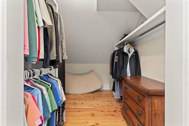 622 Beachview Dr, Saint Simons Island, GA 31522 - spacious closet with light wood-type flooring and lofted ceiling