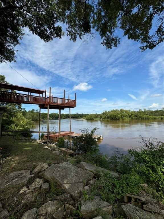 145 Getaway Ln, Surrency, GA 31563 - dock featuring a deck with water view