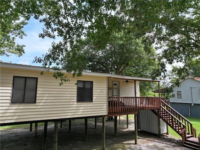 145 Getaway Ln, Surrency, GA 31563 - rear view of property with a deck, stairs, a carport, and ceiling fan