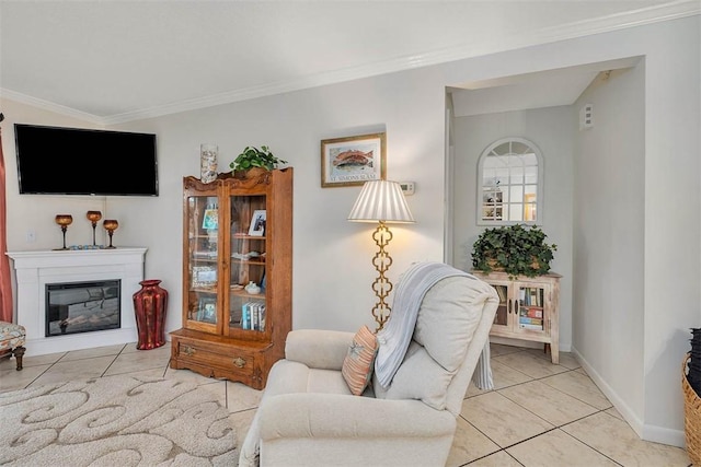 tiled living room featuring crown molding