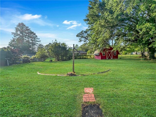 209 Lewis Dr, Rincon, GA 31326 - view of yard with an outbuilding