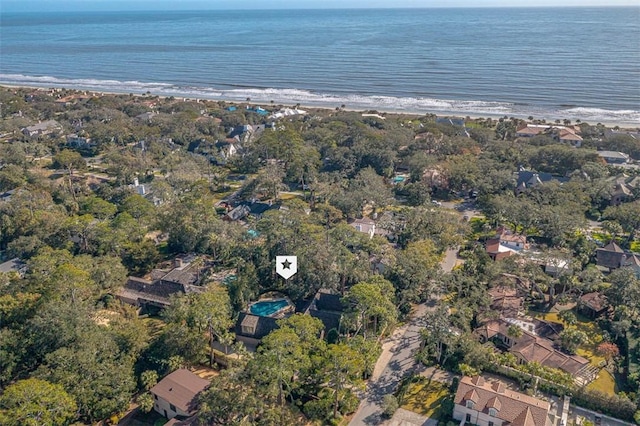 bird's eye view with a water view and a view of the beach