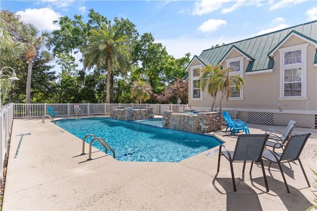 view of pool featuring fence, an in ground hot tub, a fenced in pool, and a patio area