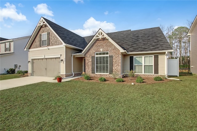 craftsman inspired home featuring concrete driveway, brick siding, roof with shingles, and a front yard