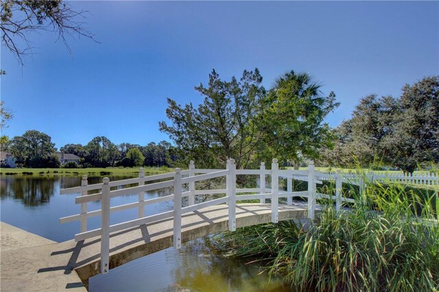 dock area featuring a water view
