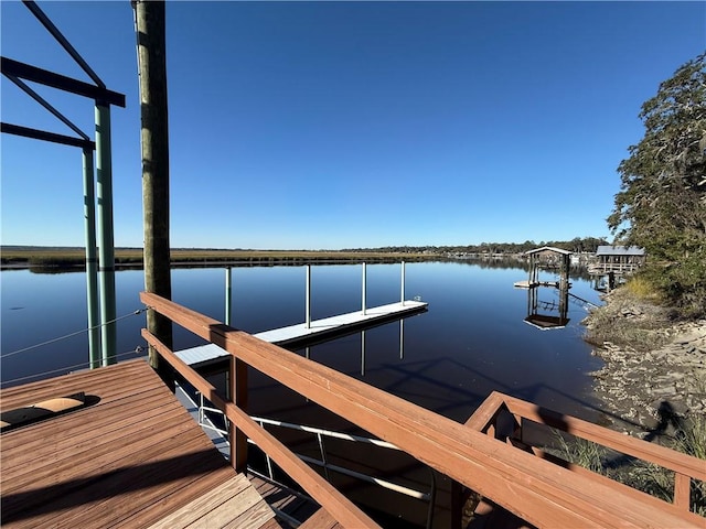 view of dock with a water view