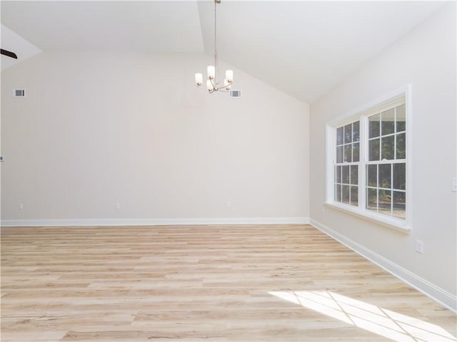 empty room with vaulted ceiling with beams, a chandelier, and light hardwood / wood-style flooring