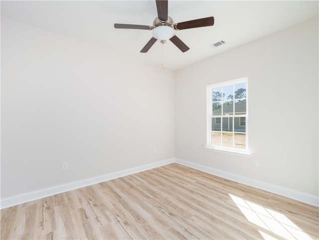 unfurnished room featuring ceiling fan and light wood-type flooring