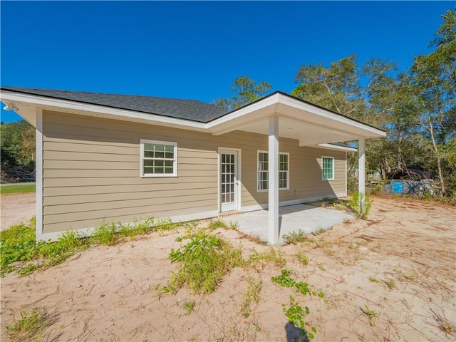 rear view of house with a patio