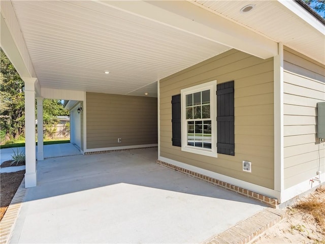 view of patio featuring a carport