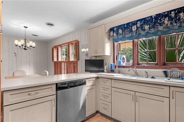 1001 Coral Rd, Waycross, GA 31501 - kitchen featuring dishwasher, a chandelier, light countertops, a peninsula, and a sink