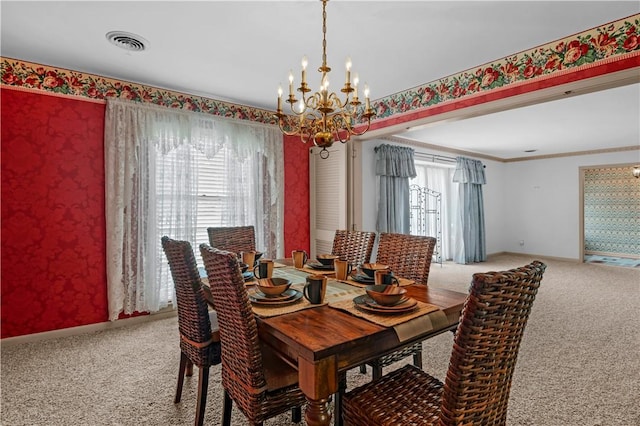 1001 Coral Rd, Waycross, GA 31501 - dining area with carpet flooring, a chandelier, baseboards, and ornamental molding