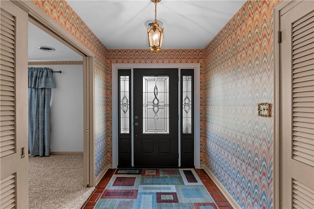 1001 Coral Rd, Waycross, GA 31501 - foyer entrance featuring wallpapered walls and baseboards
