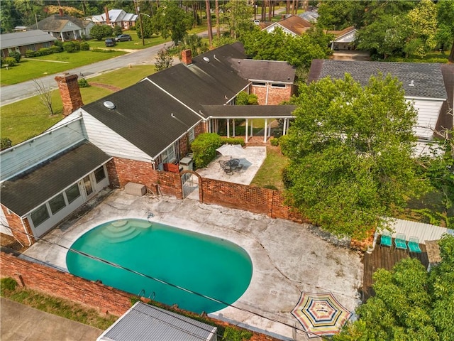1001 Coral Rd, Waycross, GA 31501 - view of swimming pool with a patio area, a residential view, a fire pit, and a fenced backyard