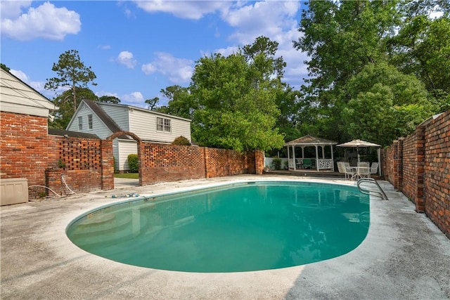 1001 Coral Rd, Waycross, GA 31501 - view of pool with a gazebo and a patio