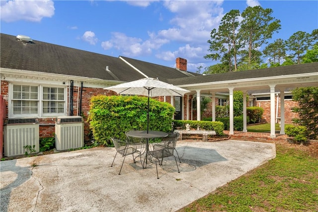1001 Coral Rd, Waycross, GA 31501 - view of patio with cooling unit and outdoor dining area