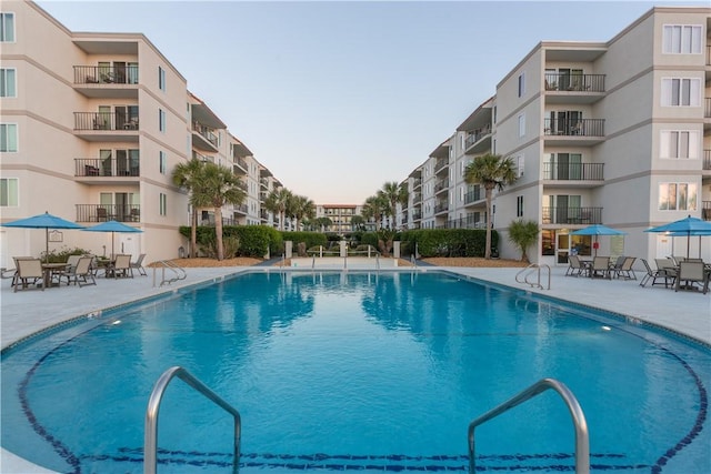 pool featuring a patio area