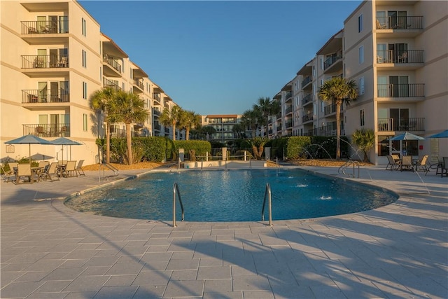 community pool featuring a patio