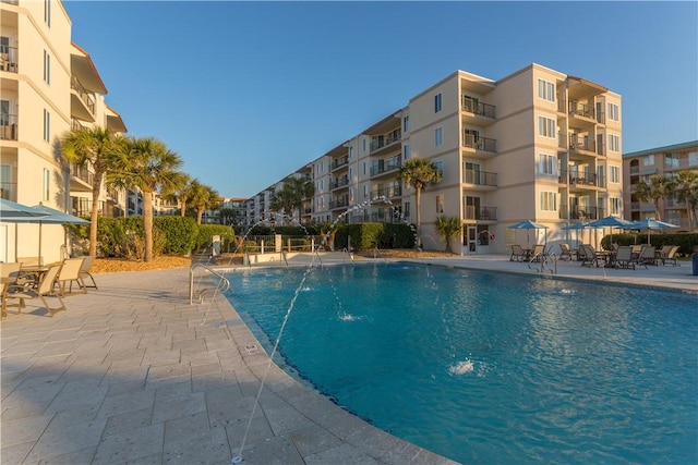 community pool featuring a patio