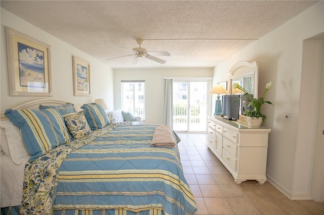 bedroom with access to exterior, baseboards, light tile patterned floors, a textured ceiling, and a ceiling fan