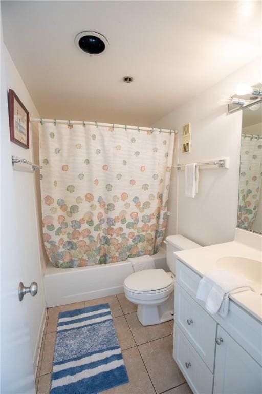 full bathroom featuring tile patterned flooring, toilet, vanity, and shower / bath combo