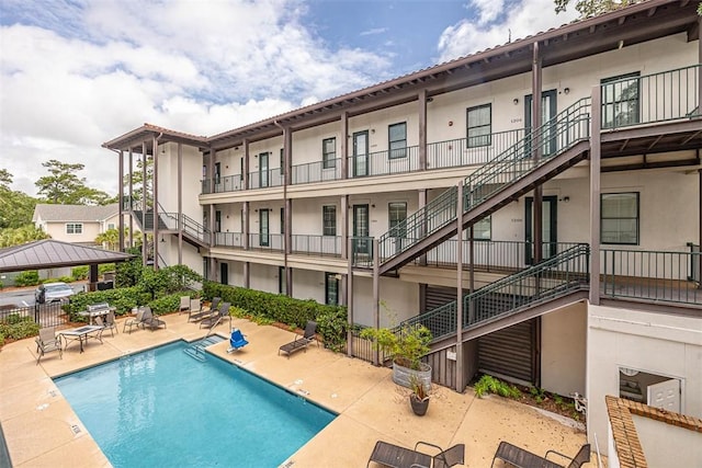 400 Ocean Blvd Unit 2207, Saint Simons Island, GA 31522 - community pool with stairway and a patio area
