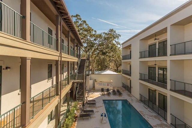 400 Ocean Blvd Unit 2207, Saint Simons Island, GA 31522 - community pool featuring stairway, a ceiling fan, and a patio