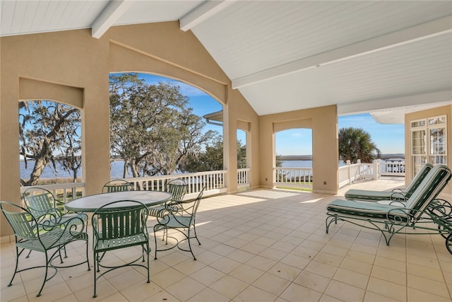 view of patio featuring a water view