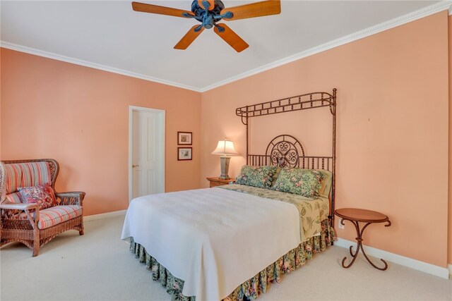 bedroom featuring carpet flooring, ceiling fan, and ornamental molding