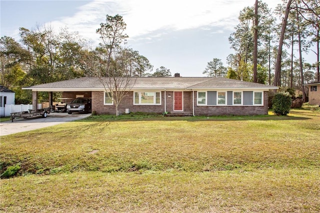 ranch-style home featuring a front yard and a carport