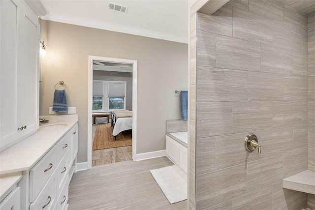 full bathroom with baseboards, visible vents, ensuite bathroom, crown molding, and vanity