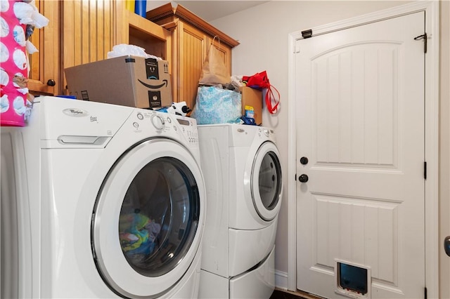 laundry area with washing machine and dryer and laundry area