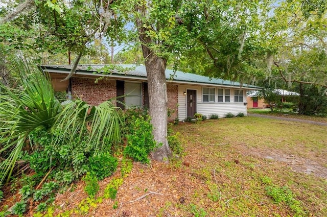 view of front of home with a front yard