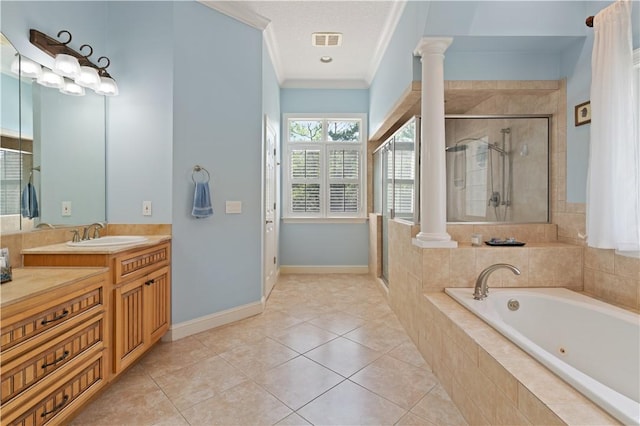 full bath with decorative columns, a bath, crown molding, a shower stall, and vanity