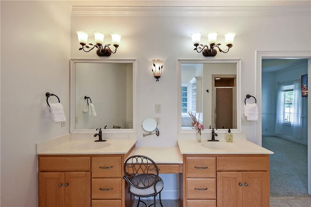 bathroom featuring vanity, a shower with shower door, and crown molding